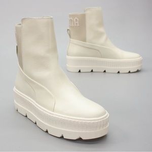 Puma women’s 9.5 Fenty Rihanna Vanilla Ice White
Leather Boots